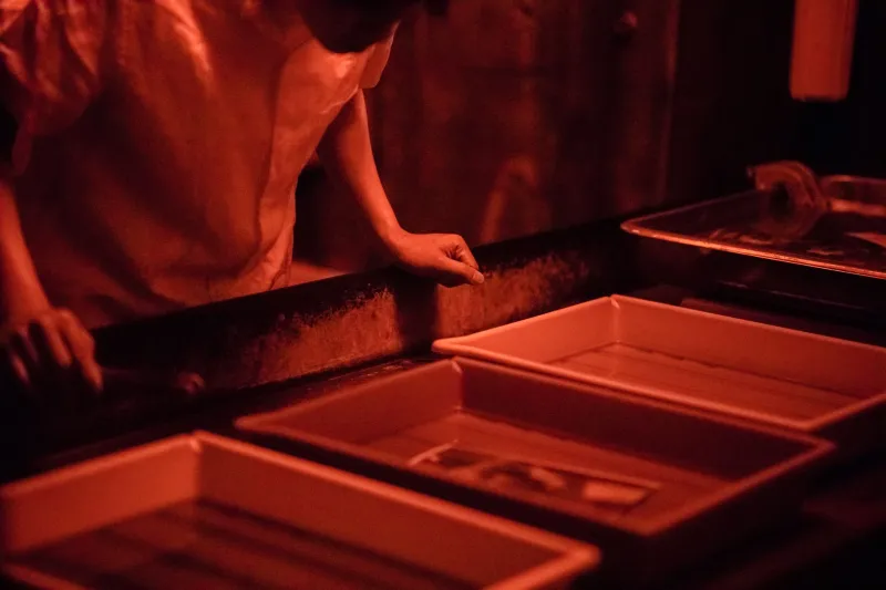 Red Light, Slow Hands: The DIY Darkroom Builders Making Sacred Spaces Out of Spare Closets